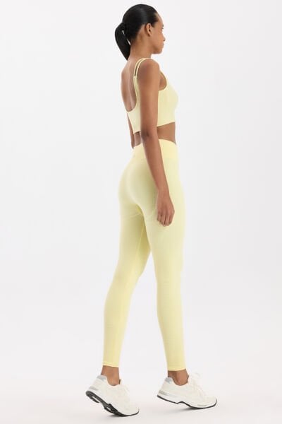Jakar Detaylı Spor Tayt Açık Sarı
