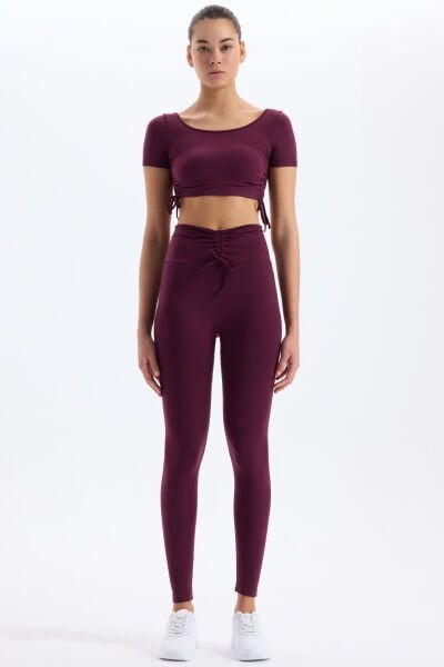 Biyeli Kemer Büzgü Detaylı Tayt Mürdüm