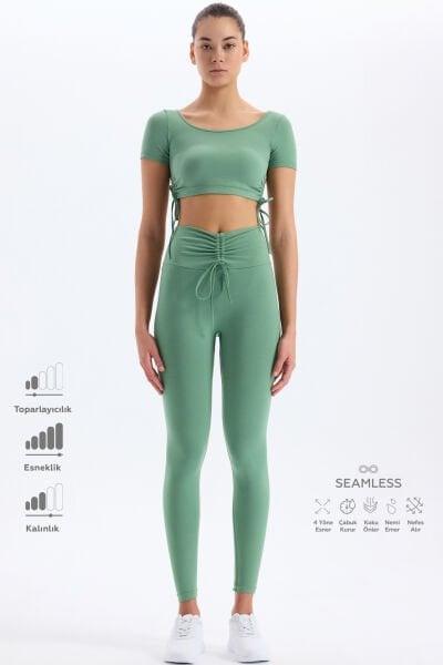 Biyeli Kemer Büzgü Detaylı Tayt Çağla