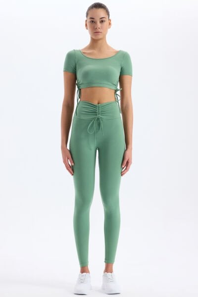 Biyeli Kemer Büzgü Detaylı Tayt Çağla