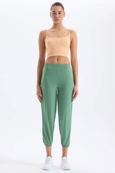 Paça Lastikli Yanları Yırtmaçlı Pantolon Çağla